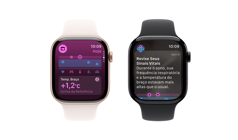 A tela de um Apple Watch Series 10 com pulseira esportiva branca mostra a Temperatura do Braço no app Sinais Vitais, ao lado está a tela de um segundo Apple Watch Series 10 com pulseira esportiva preta mostrando a análise de Temperatura do Braço e Batimentos