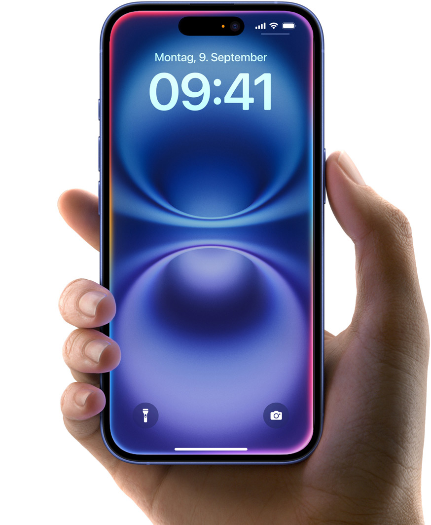 Eine Hand hält das iPhone 16 in Ultramarin, All‑Screen Display, Dynamic Island oben in der Mitte, gerundete Ecken