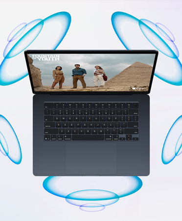 A MacBook desktop showing Spatial Audio feature.