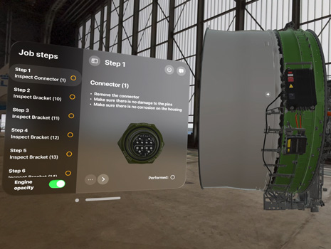 Spatial training of airplane mechanics, as seen through Apple Vision Pro. It takes place in an airplane hanger.