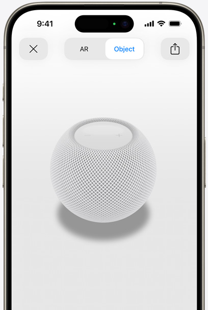 Der HomePod in Weiß auf dem Display eines iPhone in AR Ansicht.