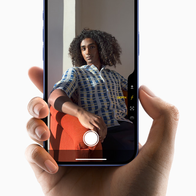En demonstrasjon av å ta et bilde med Kamerakontroll på iPhone 16. 